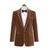 Brown velvet blazer on a mannequin with a white shirt and blue bow tie against a white background - Bown of London